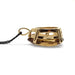 Close-up side view of 14kt yellow gold pendant setting holding pear citrine gemstone