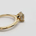 Close-up of hidden halo detail on 14kt yellow gold lab diamond engagement ring