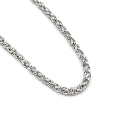 Close-up of sterling silver wheat chain bracelet links