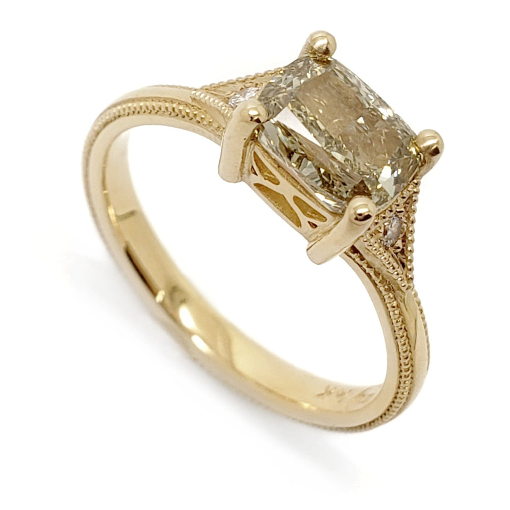 Cushion cut lab diamond engagement ring in yellow gold with pave accents