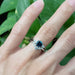 Diamond chevron wedding ring stacked with blue sapphire engagement ring