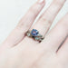 14kt white gold diamond millgrain wedding band stacked with a sapphire engagement ring