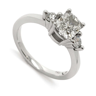 Three-stone 14kt white gold ring with cushion cut lab diamond and two round lab diamonds