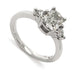 Three-stone 14kt white gold ring with cushion cut lab diamond and two round lab diamonds