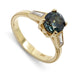 14K yellow gold ring with teal Montana sapphire and baguette diamonds, millgrain detail
