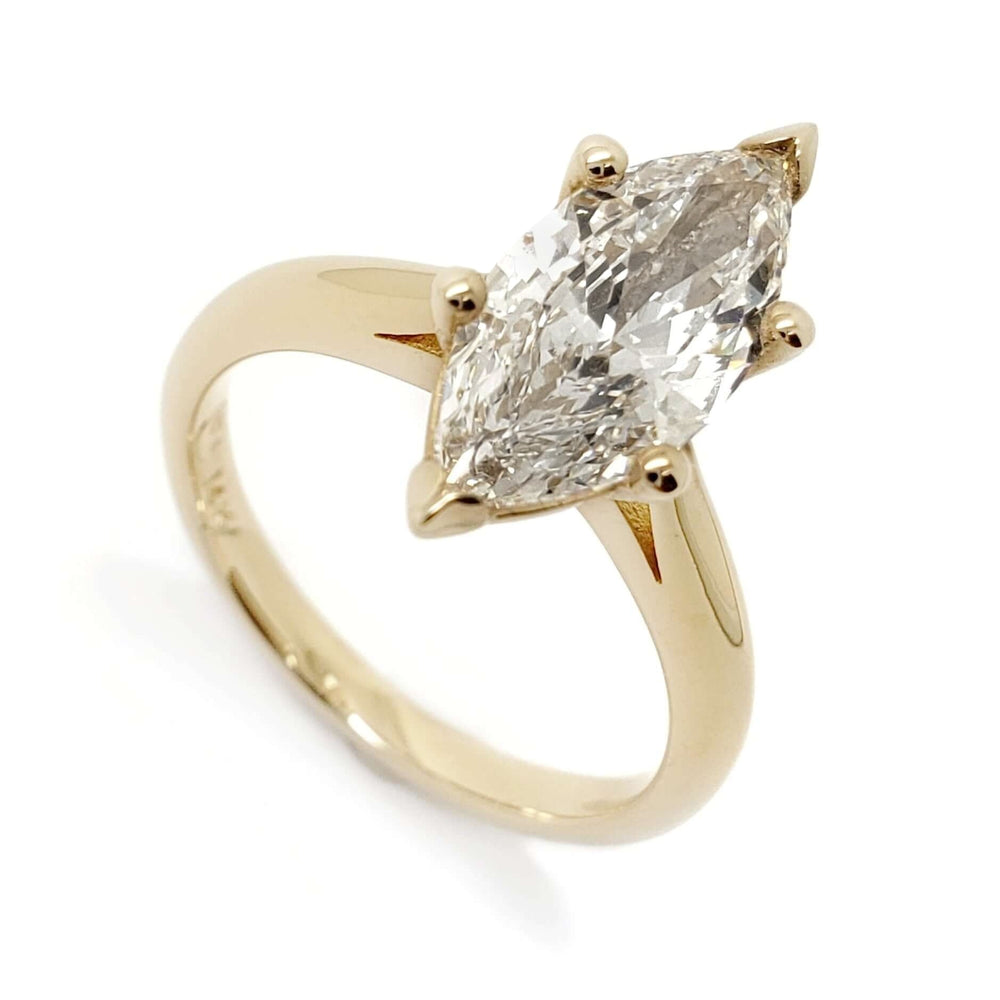 14kt yellow gold ring with marquise cut lab-grown diamond in six-prong setting