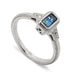 14kt white gold engagement ring with emerald cut blue Montana sapphire and Canadian diamonds