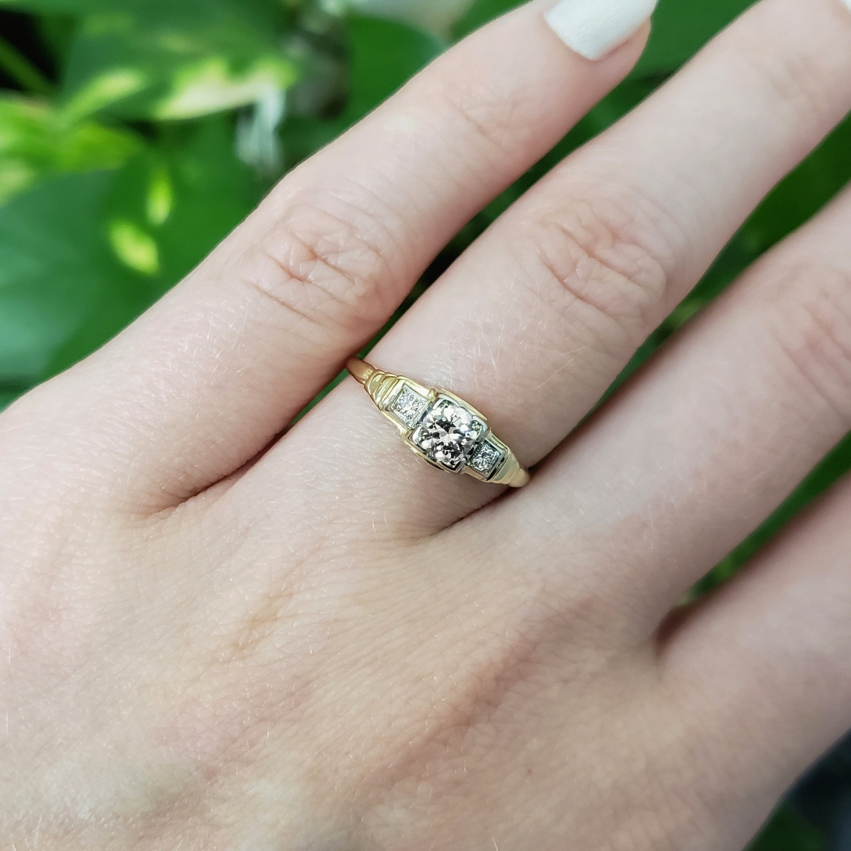 Antique Victorian era engagement ring with fleur-de-lis design