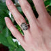 Edwardian diamond engagement ring in white gold shown on hand