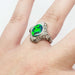 Edwardian platinum opal and diamond ring shown on hand, side view