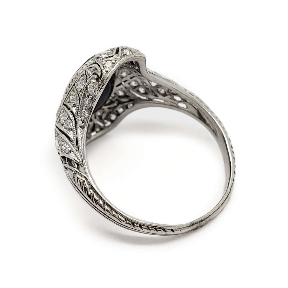 Edwardian platinum opal and diamond ring, side profile showing filigree and engraving