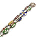 Detailed view of enamelled Canadian crest charms on sterling silver bracelet