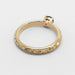 Engraved 14kt yellow gold band of Montana sapphire engagement ring, shown from above