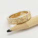 Engraved 14kt yellow gold wedding ring with Canadian diamonds, beside pencil
