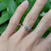 Engraved 14kt white gold chevron wedding ring stacked with diamond engagement ring