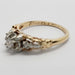 Close-up of inside band engraving on vintage yellow and white gold diamond ring