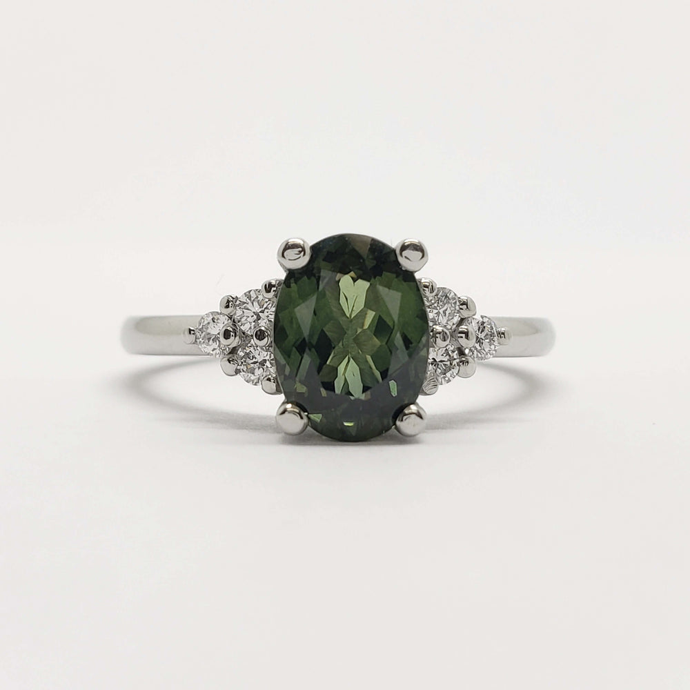 Front view of 14kt white gold ring with oval green Australian sapphire and diamonds