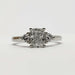 Front view of 14kt white gold engagement ring with cushion cut lab diamond and two round diamonds