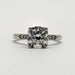 Front view of 14kt white gold engagement ring with round lab diamond and side diamonds