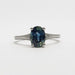 Front view of 14kt white gold ring with oval blue-green Australian sapphire and diamond accents