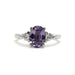Front view of 14kt white gold ring with oval lavender sapphire and lab diamonds
