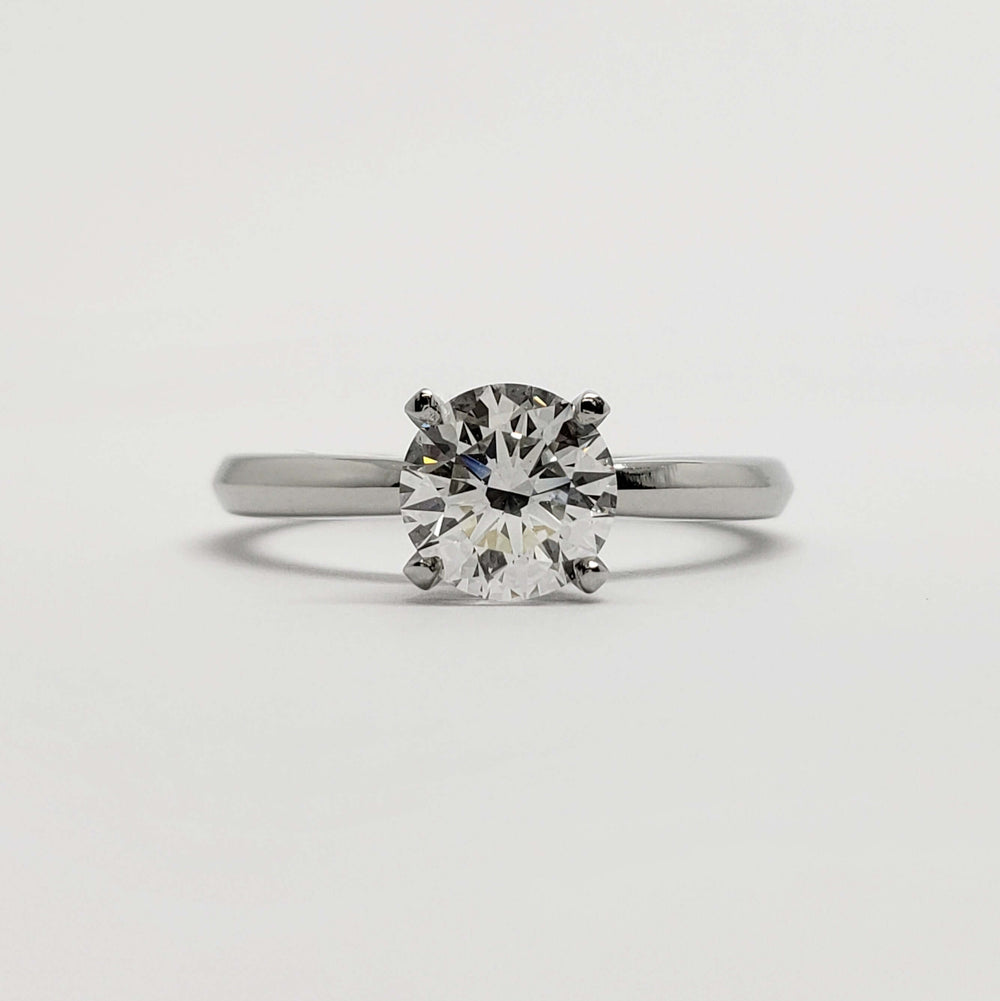 Front view of 14kt white gold solitaire ring with round lab-grown diamond