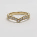 Front view of 14kt yellow gold chevron wedding ring featuring round lab diamonds