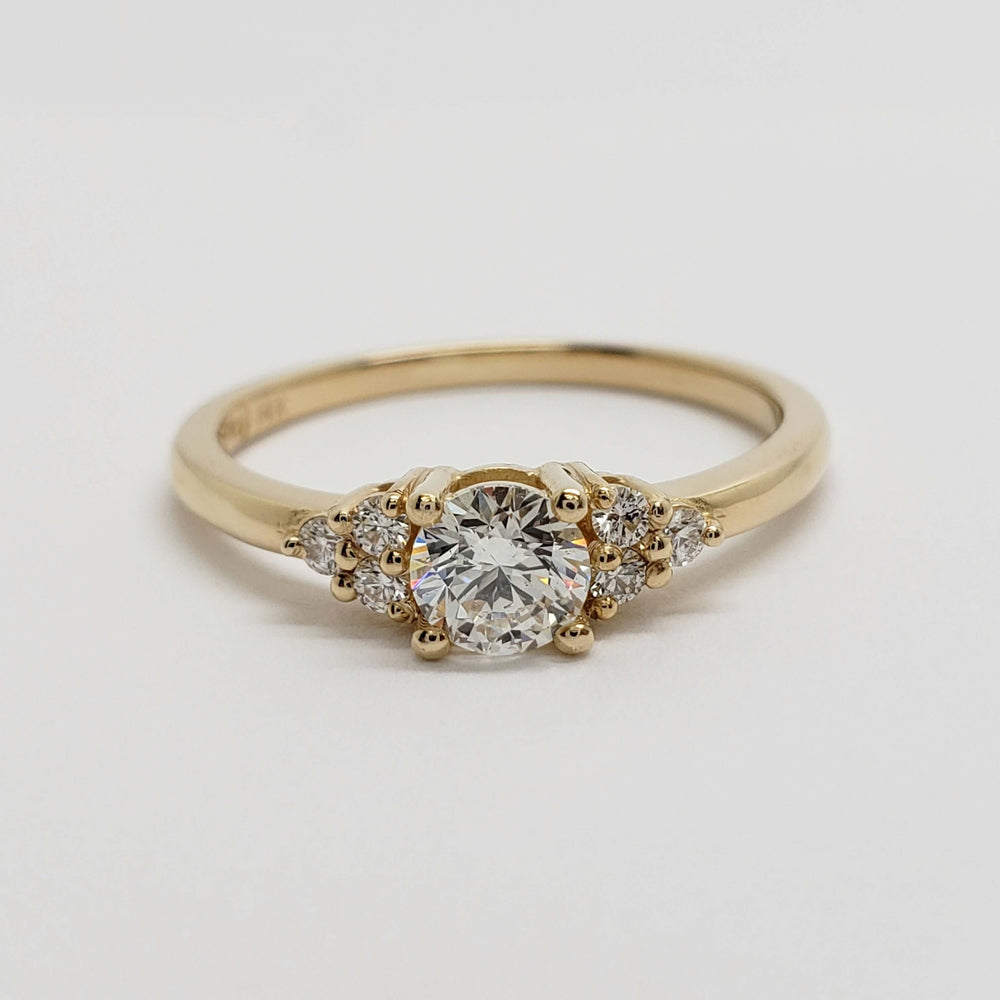 Front view of 14kt yellow gold engagement ring with Canadian diamonds
