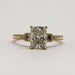 Front view of 14kt yellow gold engagement ring with cushion cut lab diamond and side stones