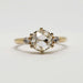 Front view of 14kt yellow gold engagement ring with rose cut lab diamond and side stones
