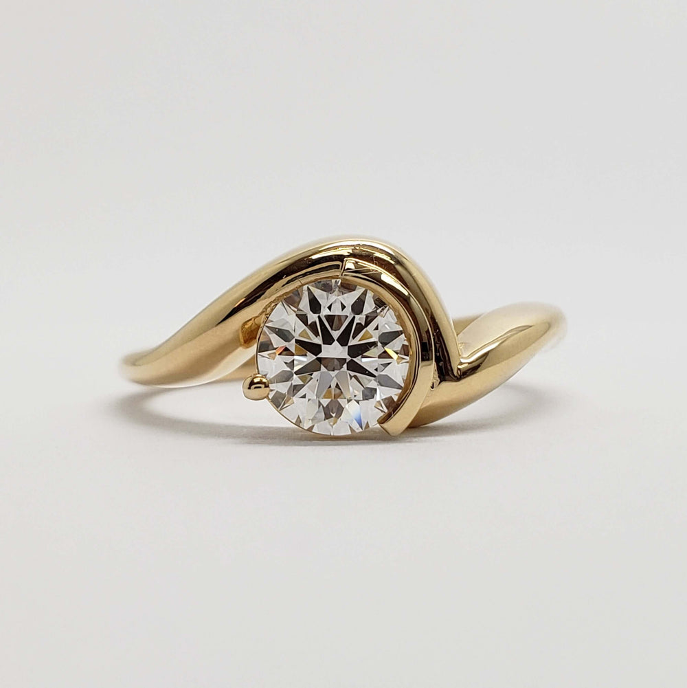 Front view of 14kt yellow gold engagement ring with round brilliant lab diamond