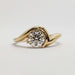 Front view of 14kt yellow gold engagement ring with round brilliant lab diamond