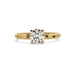Front view of 14kt yellow gold engagement ring with round lab diamond and leaf motif