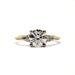 Front view of 14kt yellow gold engagement ring with round lab diamond and pear-shaped accent stones