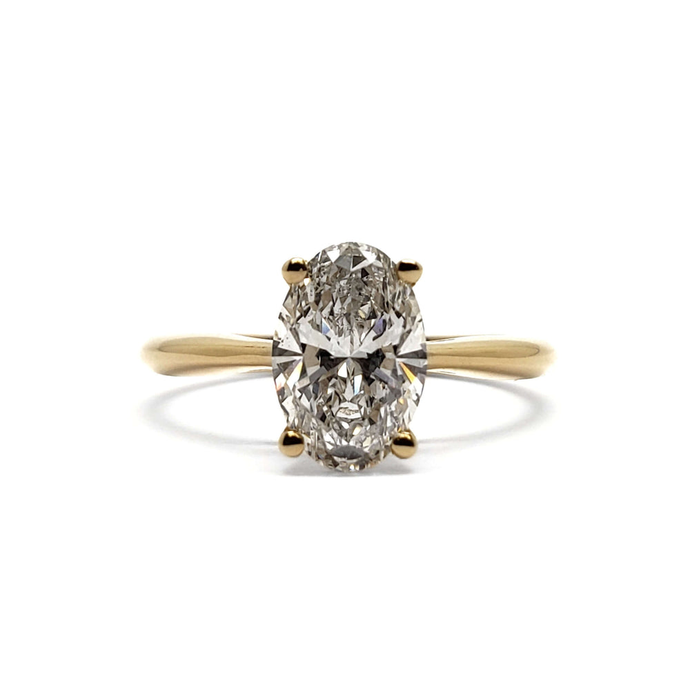 Front view of 14kt yellow gold ring with oval lab-grown diamond