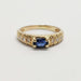 Front view of 14kt yellow gold pinky ring with blue sapphire and diamonds