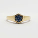 Front view of 14kt yellow gold ring with hexagon teal Montana sapphire