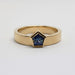 Front view of 14kt yellow gold ring with pentagon-cut blue sapphire
