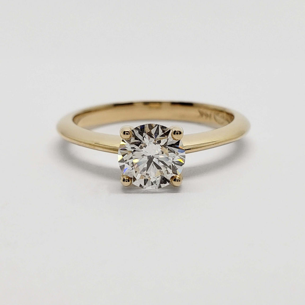 Front view of 14kt yellow gold solitaire engagement ring with round lab diamond