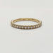 Front view of 14kt yellow gold wedding ring with pave-set lab diamonds