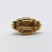 Front view of antique 18kt yellow gold fob pendant with bezel-set oval citrine