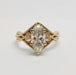 Front view of Eowyn ring with marquise-oval lab diamond and small lab diamond accents