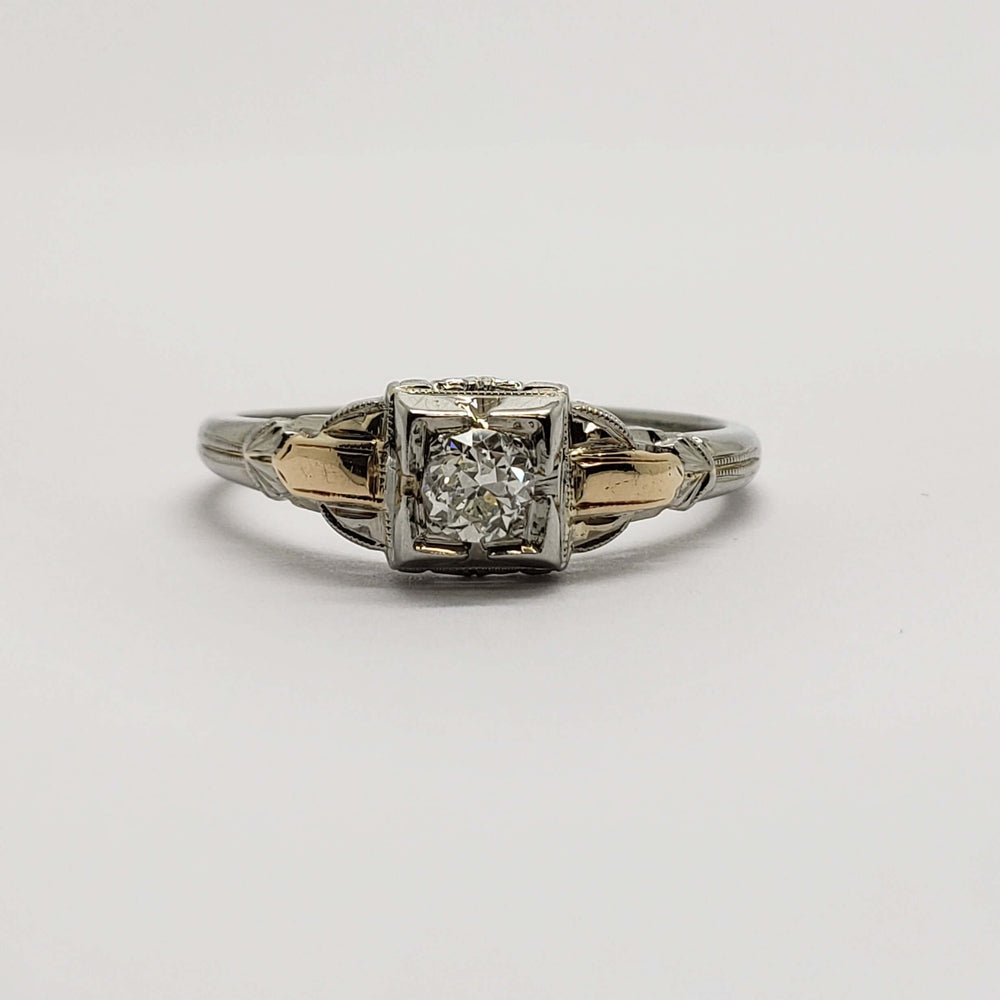 Front view of antique 14kt white and yellow gold ring with old European cut diamond