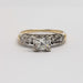 Front view of antique diamond engagement ring with illusion-set centre in 14kt gold
