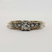 Front view of antique diamond ring in yellow and white gold with transitional cut centre diamond