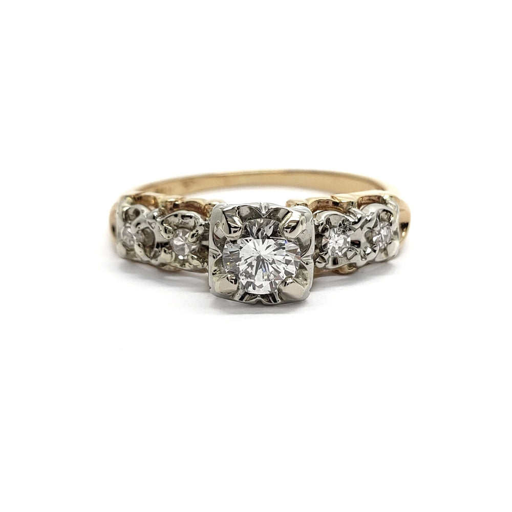 Front view of antique five stone diamond ring in yellow and white gold