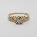 Front view of antique floral diamond ring in yellow and white gold