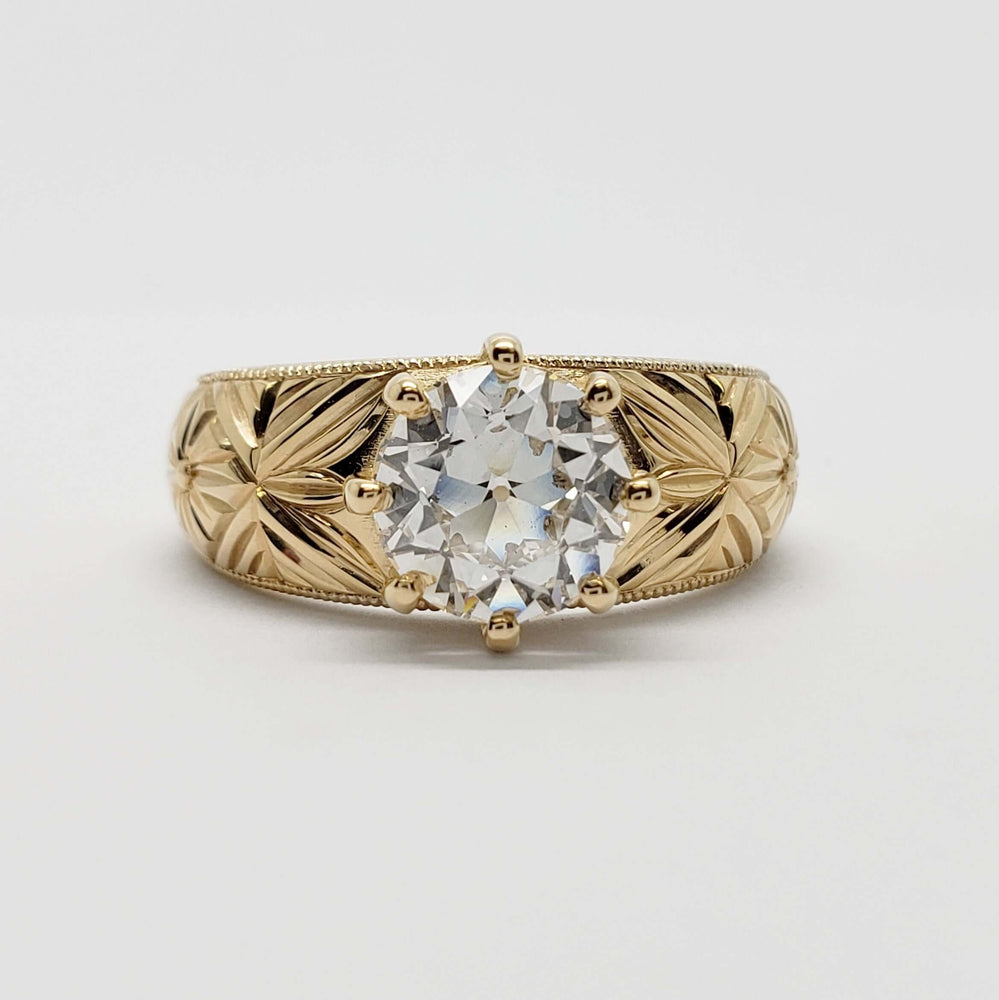 Front view of engraved 14kt yellow gold ring with round lab-grown diamond