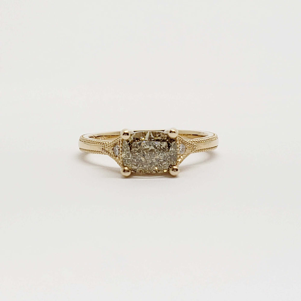 Front view of handcrafted yellow gold engagement ring with cushion lab diamond