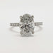 Front view of oval lab diamond engagement ring in 14kt white gold with pave setting